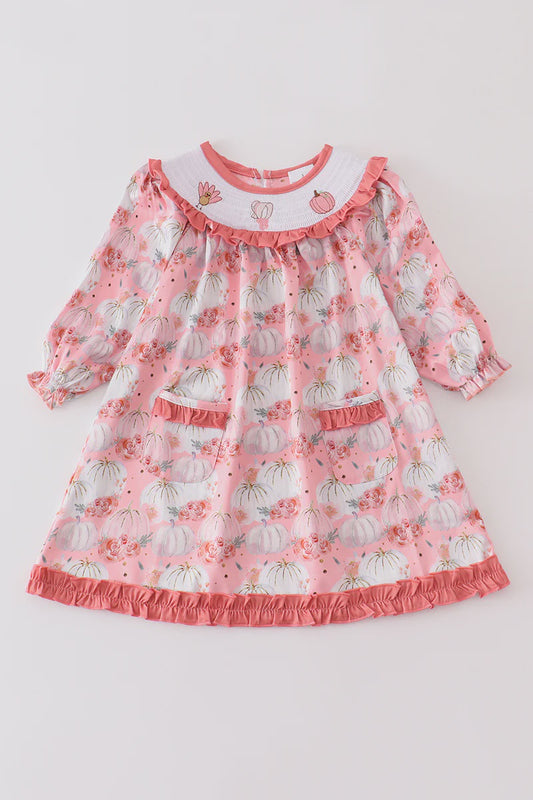 Pink pumpkin print smocked dress