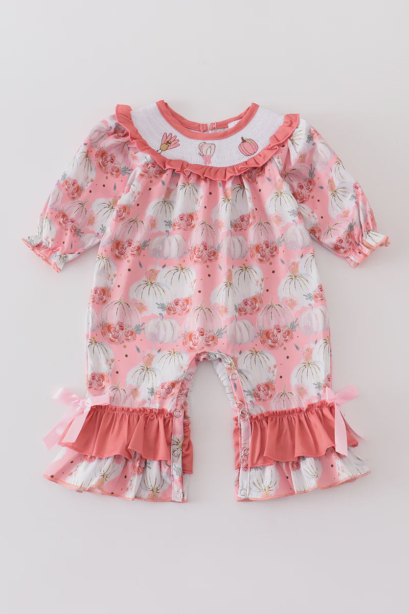 Pink pumpkin print smocked baby romper